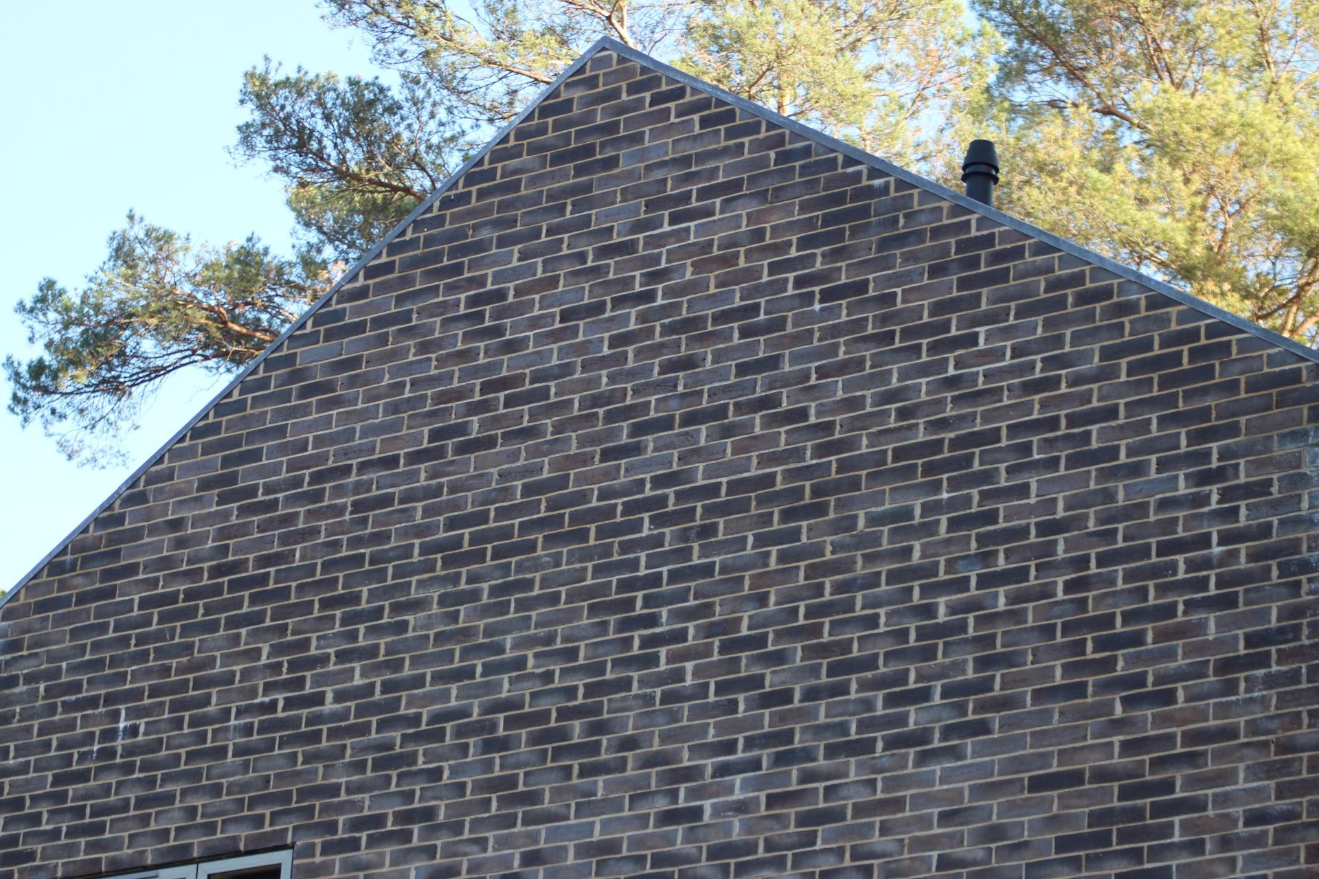 an image of a yellow brick residential building